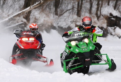 snowmobiles in action