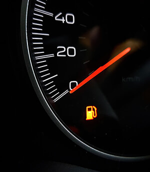 Low Fuel Warning on Car Dashboard